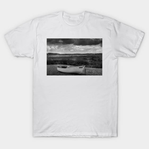 Boat on a shingle beach T-Shirt by avrilharris